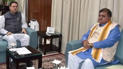 cm-dhami-along-with-bjp-state-president-mahendra-bhatt_1695619583